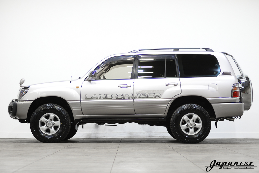 Miniature BC866 Vitesse 1/43 Toyota Land Cruiser 1998 – Bleu Et Argent, état Neuf